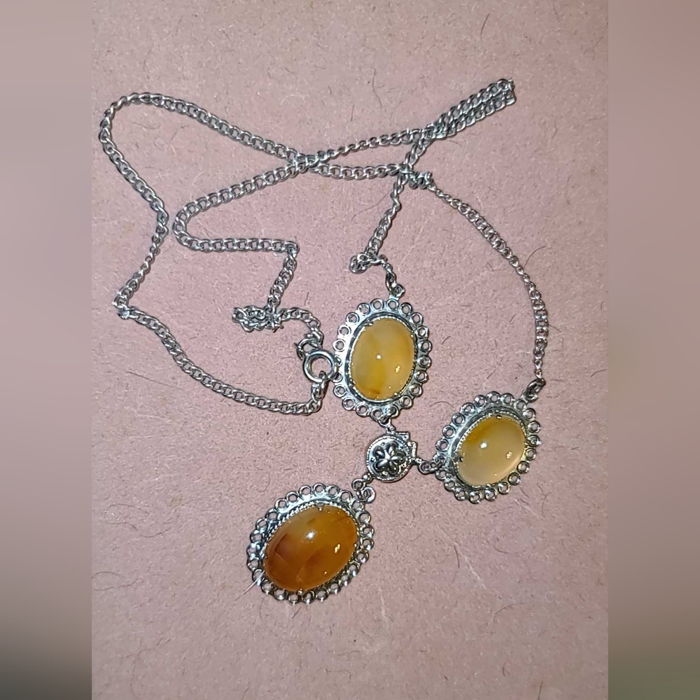 Carnelian and amber is SS. Vintage from the 1970's